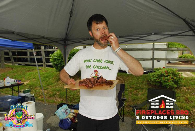 man eating wings at eggfest