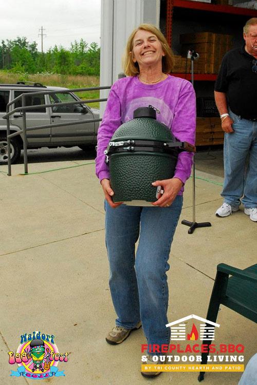 woman carrying small green egg