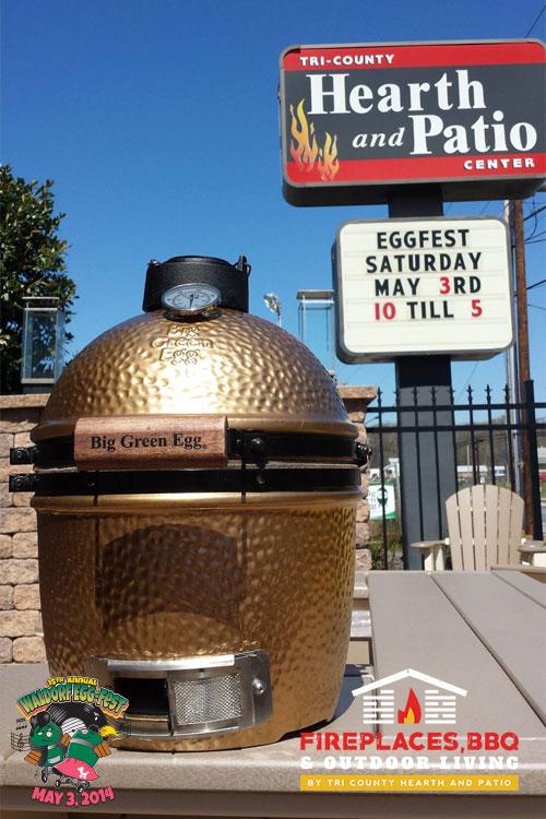 Big Green Egg grill with Tri-County store sign