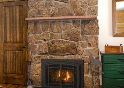 fireplace insert with stone surround