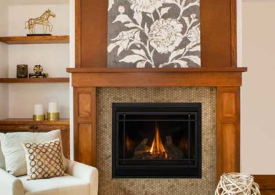 fireplace insert with tile surround and wooden mantel
