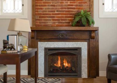 fireplace insert with wooden mantel