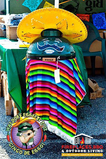 Green egg grill dressed up in mariachi attire